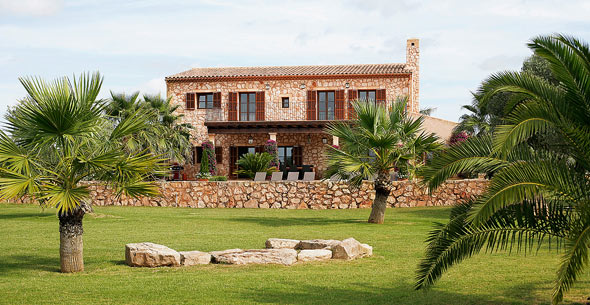 Im Garten mit Palmen, Zitronen- und Olivenbäumen Palmengarten
